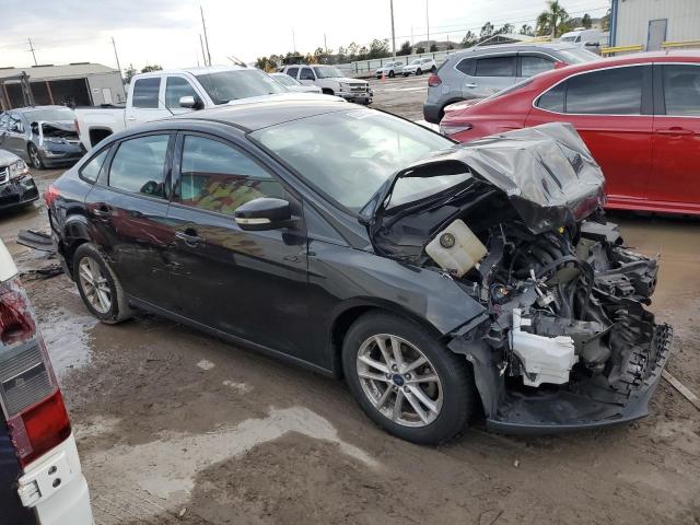 1FADP3F24FL209262 - 2015 FORD FOCUS SE BLACK photo 4