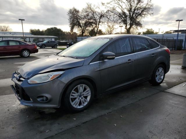 1FAHP3H28CL337496 - 2012 FORD FOCUS SEL GRAY photo 1