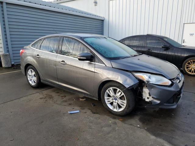 1FAHP3H28CL337496 - 2012 FORD FOCUS SEL GRAY photo 4