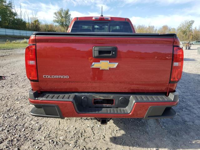 1GCHTDE39G1386524 - 2016 CHEVROLET COLORADO Z71 RED photo 6
