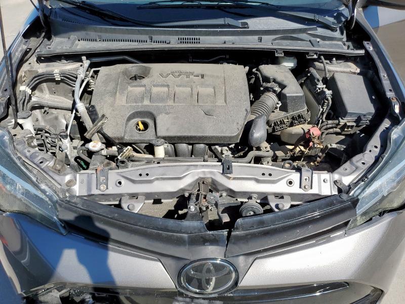 5YFBURHE2JP802316 - 2018 TOYOTA COROLLA L თაფლისფერი ფოტო 11