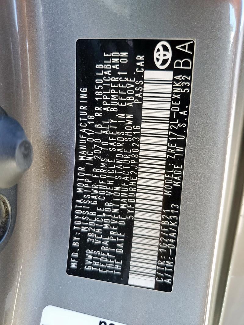 5YFBURHE2JP802316 - 2018 TOYOTA COROLLA L თაფლისფერი ფოტო 12