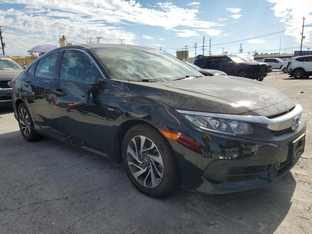 2HGFC2F77JH583943 - 2018 HONDA CIVIC EX შავი ფოტო 4