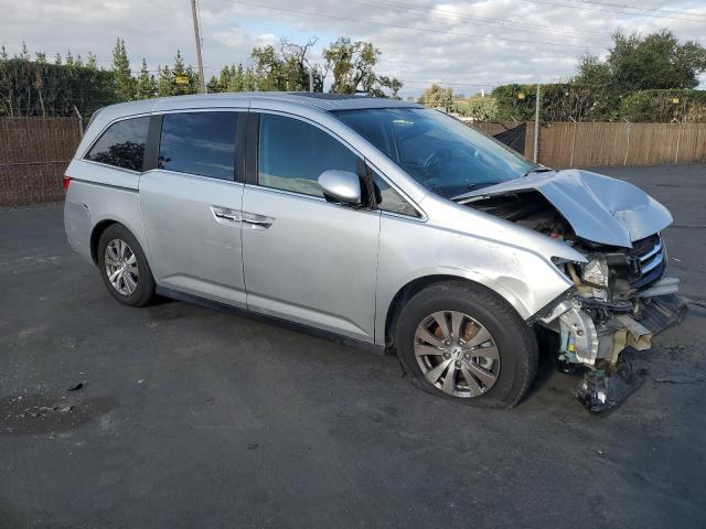 5FNRL5H63FB014652 - 2015 HONDA ODYSSEY EXL SILVER photo 4