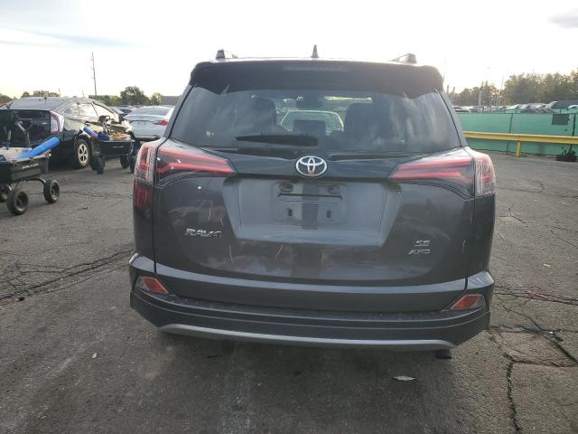 JTMJFREV7JJ218296 - 2018 TOYOTA RAV4 SE 灰色 照片 6