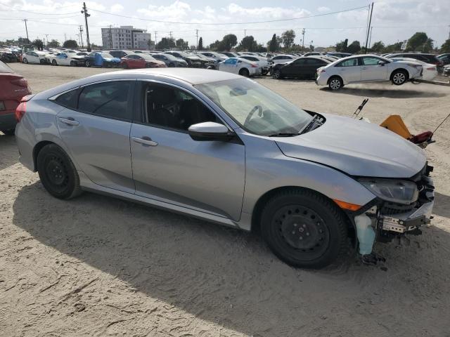 2HGFC2F6XKH574954 - 2019 HONDA CIVIC LX Сріблястий фото 4