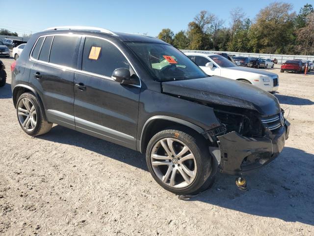 WVGAV7AX2DW516000 - 2013 VOLKSWAGEN TIGUAN S BLACK photo 4