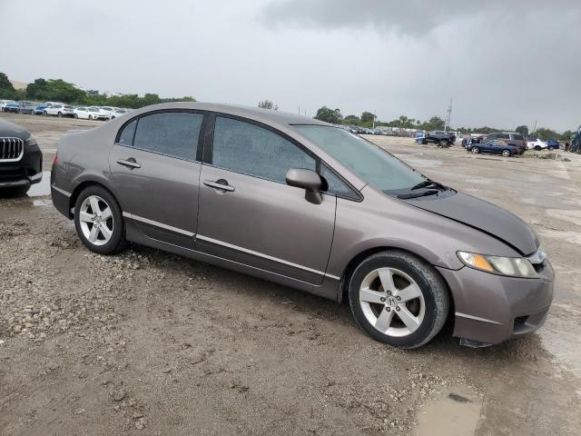 19XFA1F69BE044890 - 2011 HONDA CIVIC LX-S رمادي صورة 4