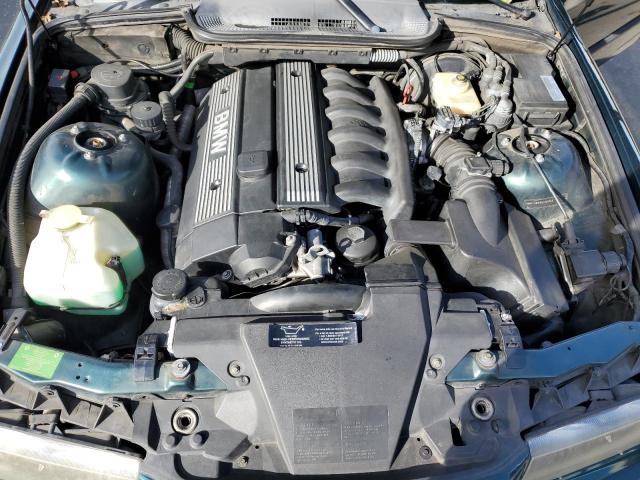 WBABJ8330XEM25304 - 1999 BMW 323 IC AUTOMATIC GREEN photo 11