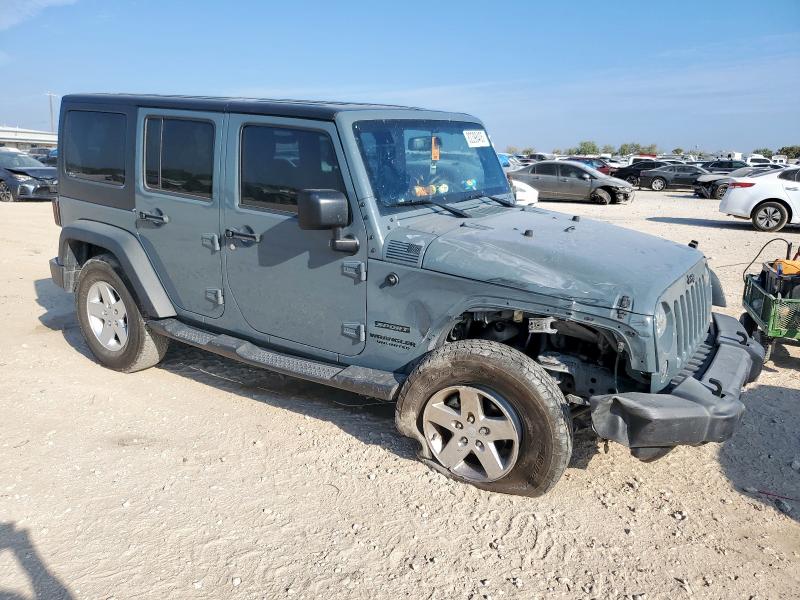 1C4HJWDG9FL560178 - 2015 JEEP WRANGLER U SPORT Синий фото 4