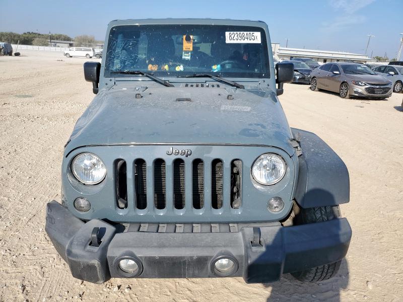 1C4HJWDG9FL560178 - 2015 JEEP WRANGLER U SPORT Синий фото 5