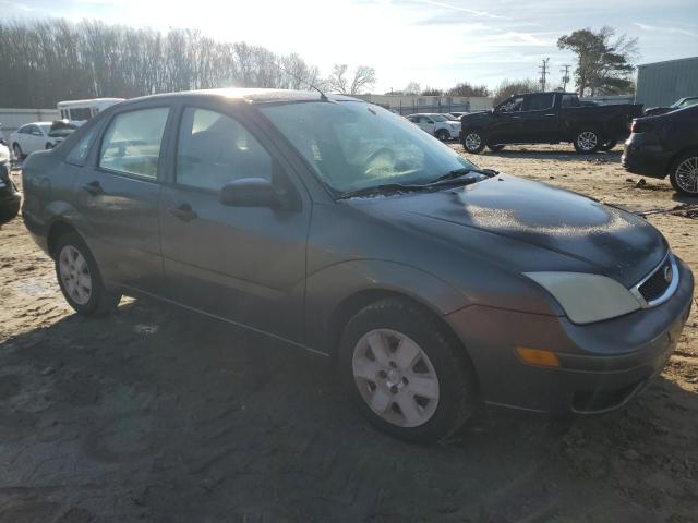 1FAHP34N67W343107 - 2007 FORD FOCUS ZX4 GRAY photo 4