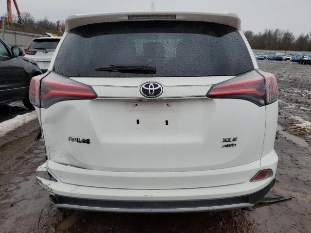 JTMRFREV7GJ074616 - 2016 TOYOTA RAV4 XLE WHITE photo 6