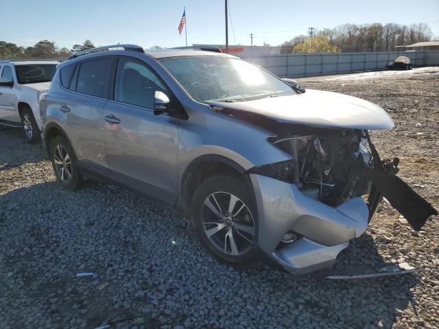 2T3WFREV0GW304100 - 2016 TOYOTA RAV4 XLE SILVER photo 4