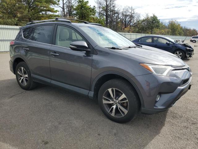 JTMRFREV0HJ129117 - 2017 TOYOTA RAV4 XLE GRAY photo 4