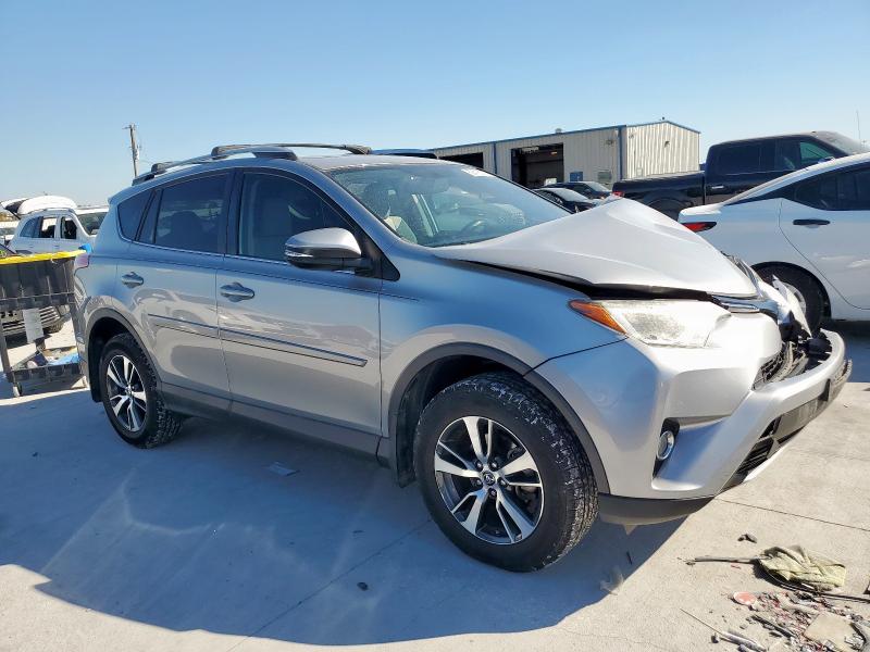 2T3WFREV2GW268443 - 2016 TOYOTA RAV4 XLE SILVER photo 4