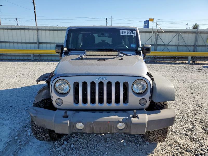 1C4BJWDG9FL624399 - 2015 JEEP WRANGLER U SPORT Plata foto 5