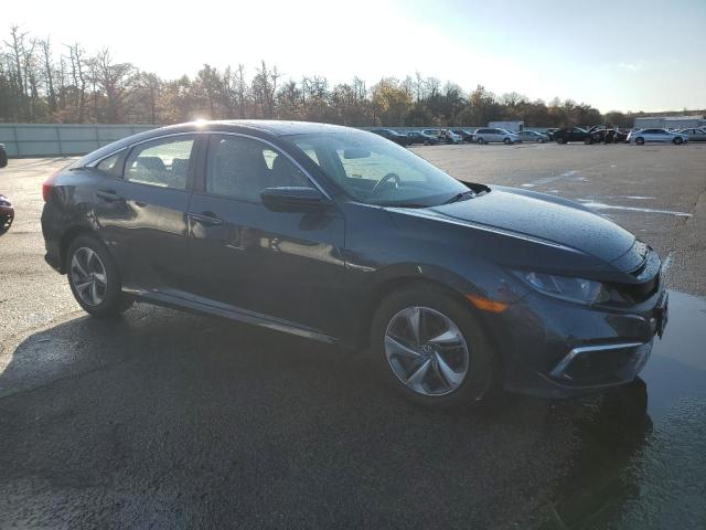 2HGFC2F6XKH532543 - 2019 HONDA CIVIC LX ნაცრისფერი ფოტო 4