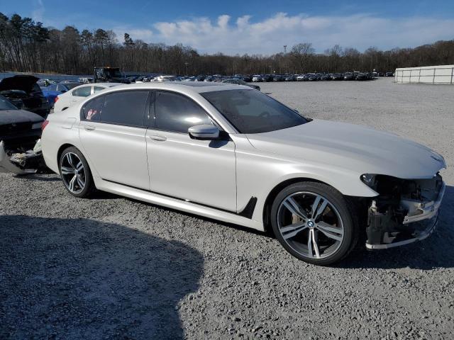 WBA7E2C56GG504571 - 2016 BMW 740 I WHITE photo 4