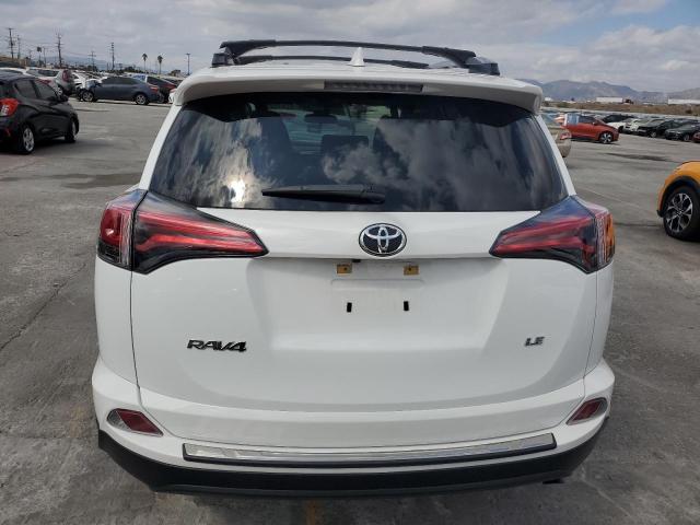 JTMZFREV9JJ197244 - 2018 TOYOTA RAV4 LE WHITE photo 6
