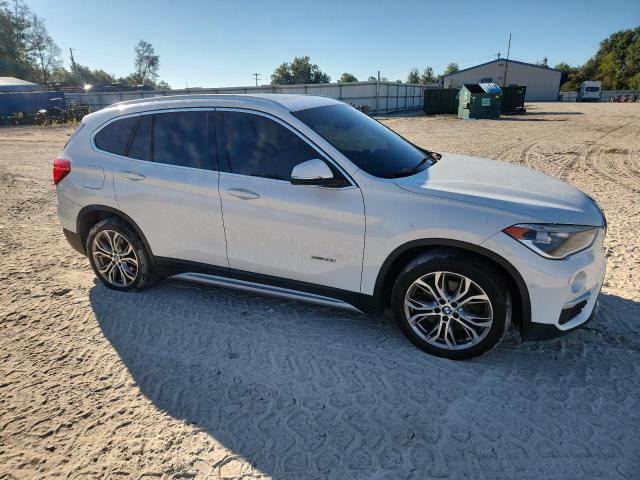 WBXHT3C34GP888323 - 2016 BMW X1 XDRIVE28I WHITE photo 4