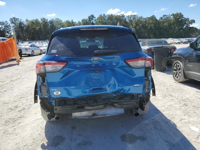 1FMCU9H62LUB17232 - 2020 FORD ESCAPE SEL BLUE photo 6