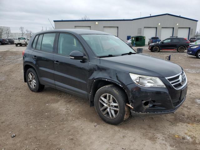 WVGBV7AX2BW515690 - 2011 VOLKSWAGEN TIGUAN S BLACK photo 4