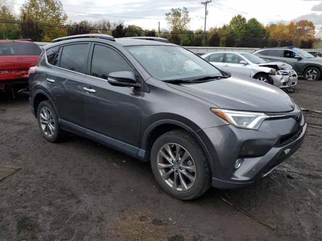 JTMDFREV9HJ711484 - 2017 TOYOTA RAV4 LIMITED Graphite photo 4