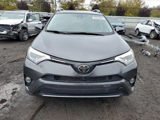JTMDFREV9HJ711484 - 2017 TOYOTA RAV4 LIMITED Graphite photo 5