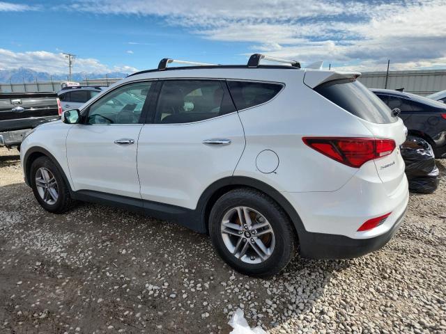 5NMZUDLB1HH011844 - 2017 HYUNDAI SANTA FE S WHITE photo 2