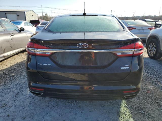 3FA6P0T98HR127564 - 2017 FORD FUSION SE BLACK photo 6