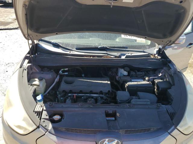 KM8JU3AC2CU444816 - 2012 HYUNDAI TUCSON GLS Коричневий фото 12