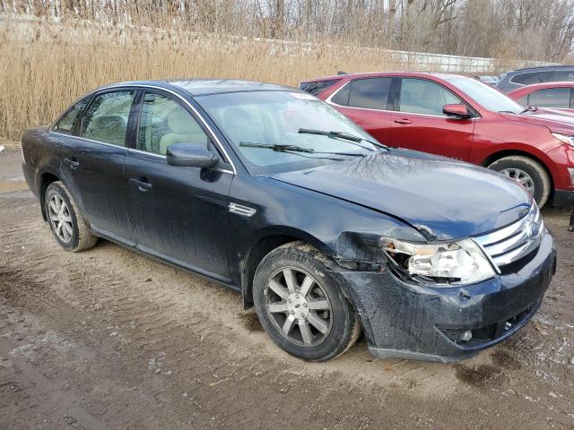 1FAHP27W48G167572 - 2008 FORD TAURUS SEL BLUE photo 4