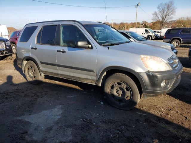 JHLRD78526C035962 - 2006 HONDA CR-V LX BLUE photo 4