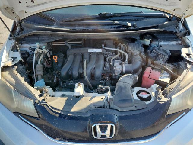 JHMGK5H72GX000931 - 2016 HONDA FIT EX WHITE photo 11