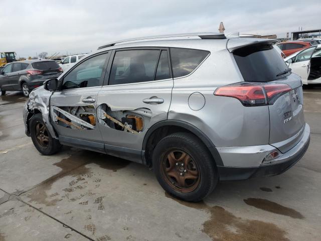 2T3ZFREV0HW373772 - 2017 TOYOTA RAV4 LE SILVER photo 2