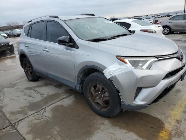 2T3ZFREV0HW373772 - 2017 TOYOTA RAV4 LE SILVER photo 4