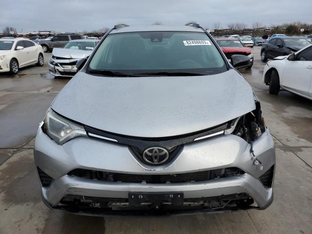 2T3ZFREV0HW373772 - 2017 TOYOTA RAV4 LE SILVER photo 5