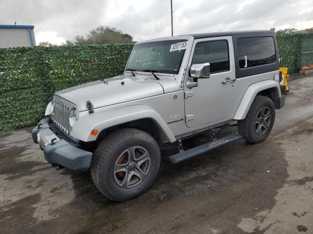 1C4AJWBG6CL168615 - 2012 JEEP WRANGLER SAHARA SILVER photo 1