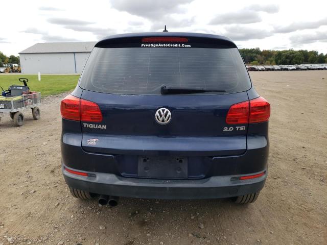 WVGAV3AX7EW567292 - 2014 VOLKSWAGEN TIGUAN S ლურჯი ფოტო 6