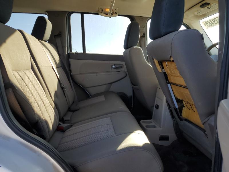 1J8GP28K39W503746 - 2009 JEEP LIBERTY SPORT WHITE photo 11