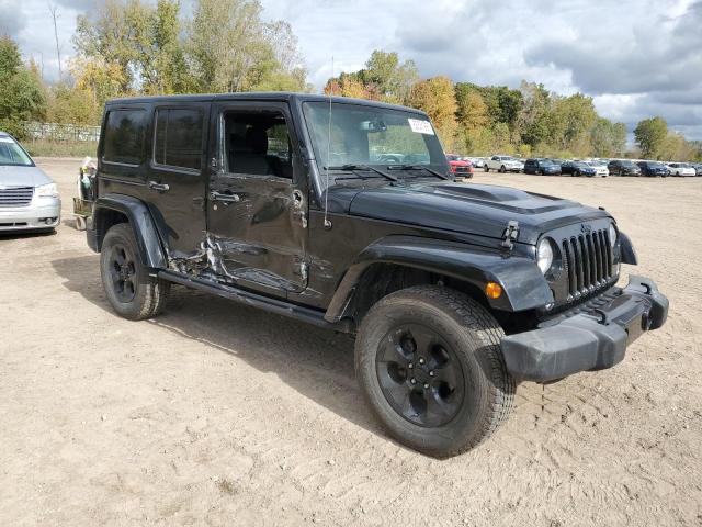 1C4BJWEG3FL714484 - 2015 JEEP WRANGLER U SAHARA BLACK photo 4