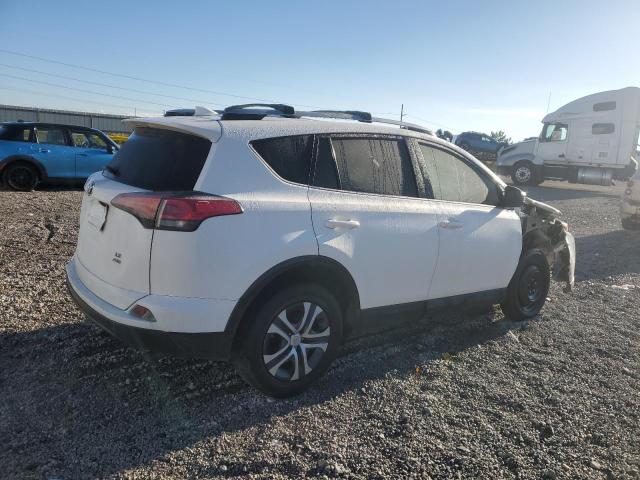 JTMBFREVXJJ719770 - 2018 TOYOTA RAV4 LE Սպիտակ լուսանկար 3