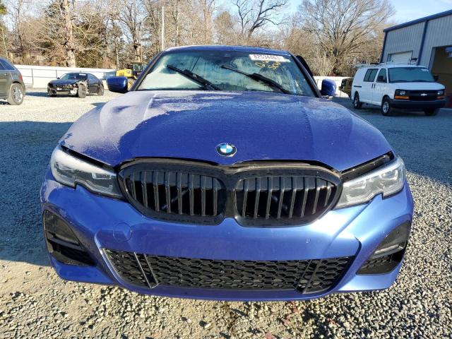 3MW5R7J06L8B13199 - 2020 BMW 330XI BLUE photo 5