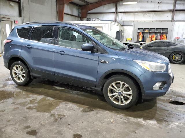 1FMCU9GD4JUA95277 - 2018 FORD ESCAPE SE BLUE photo 4