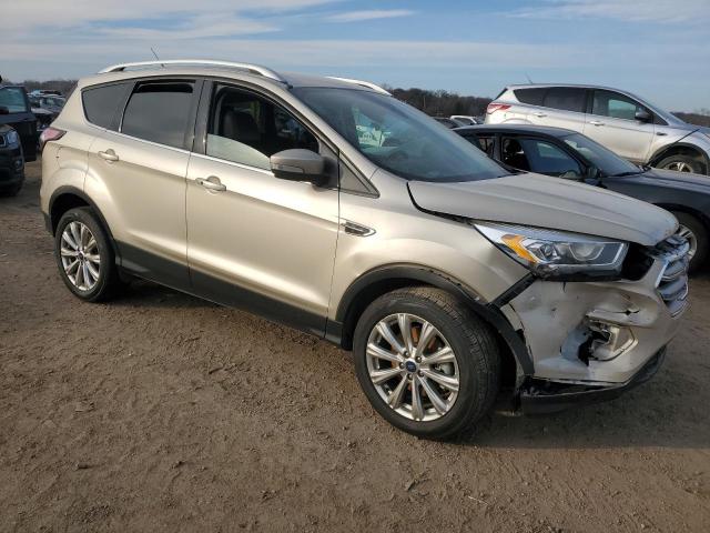 1FMCU9J92HUE92632 - 2017 FORD ESCAPE TITANIUM GOLD photo 4