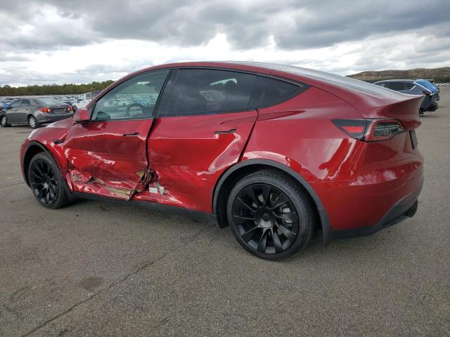 7SAYGAEEXRF018760 - 2024 TESLA MODEL Y RED photo 2