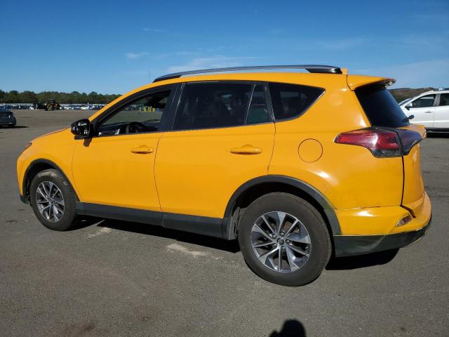 JTMRJREV1JD224322 - 2018 TOYOTA RAV4 HV LE YELLOW photo 2