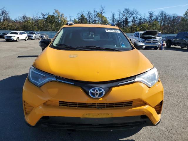JTMRJREV1JD224322 - 2018 TOYOTA RAV4 HV LE YELLOW photo 5