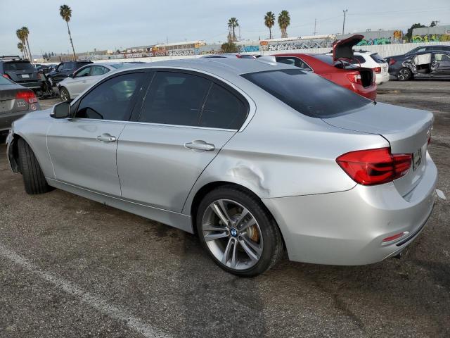 WBA8B9C59JEE82187 - 2018 BMW 330 I SILVER photo 2